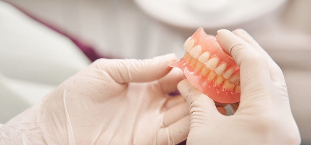 Dental Implants vs. Dentures: Making the Right Choice for Your Lifestyle in New Jersey